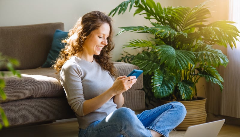 Airbnb host writing a guest review from their phone