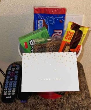 Airbnb welcome basket with movie snacks